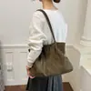 Bolsa Tote Feminina Versátil de Outono 2026 Grande Capacidade Nova Bolsa Exquisita Bolsa de Mão Retrô para o Trabalho Bolsa de Ombro Elegante de Camurça
