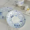 Juego de Regalo de Taza y Platillo para Café de Porcelana de Hueso Azul y Blanco de Alta Gama Estilo Japonés Venta al por Mayor Taza y Platillo de Lujo Ligero Vintage para la Tarde