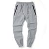Pantalones deportivos casuales con bandas de pierna de primavera 2020, pantalones deportivos elásticos para hombres, pantalones de pierna elástica para jóvenes, pantalones deportivos elásticos para hombres.