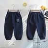 Calça de moletom infantil para primavera e outono, calça longa casual solta para bebê, caimento oversized, calça versátil de outer wear esportivo unissex para criança pequena