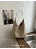 Bolsa de palha tecida retrô para mulheres 2026 nova moda versão coreana bolsa tote simples de grande capacidade para ombro de trabalho bolsa de axila