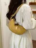 Bolsa de axila feminina de nicho transfronteiriça, novo modelo de verão 2026, simples e versátil para o dia a dia, bolsa de ombro única cruzada estilo bolinho
