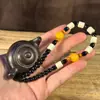 Pieza de mango para tallado de ébano al por mayor Colgante de tallado Seiko Pieza de mango de juego de texto de madera creativa Colgante ornamento