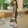 Gola Redonda Uniboto Cor Sólida Sem Mangas Aparência Emagrecedora Saia Evasê 2025 Novo Estilo Japonês Vestido Colete Solto Vestido Longo