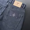 Novos jeans masculinos 2026 de perna reta e corte solto, com interior macio, elástico e escovado, adequados para uso casual e versáteis com qualquer roupa