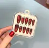 Nuevo producto transfronterizo: Puntas de Uñas Ojo de Gato Color Rojo Vino Cereza Rojo Profundo Bombilla, Caja de 10 Piezas con Tallas Codificadas, Puntas de Uñas Portátiles Ojo de Gato