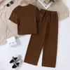 Moda Europeia e Americana Meninas Verão Design Plissado Manga Curta Top + Calça Conjunto de Duas Peças Infantil Ins