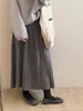 Saia midi de tricô, fluida e plissada para mulheres, nova coleção outono/inverno 2026, corte solto, espessada para aquecer, design elegante em A com barra larga