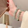 Pulseira de miçangas com senso de design avançado, pulseira de pérolas de nicho de luxo leve, pulseira de temperamento feminina que combina com tudo, pulseira vermelha da internet, joias por atacado