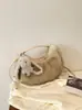 Bolsa de Textura Fofa Feminina 2026 Outono Novo Estilo Moda Versátil Simples Bolsa de Ombro Bolsa Transversal de Mão Feminina