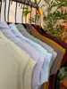 Camiseta de Manga Corta Ajustada Elástica de Cuello Medio para Mujer 2026 Nuevo Diseño de Alta Gama Nicho