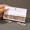 Conjunto de Brincos Cruzados Mais Vendido Estilo Europeu e Americano Coração Fofo Feminino em Forma de Borboleta, Brincos de Metal Modernos e Versáteis para Mulheres