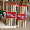 Palillos rojos chinos tienda de 2 yuan palillos de mercancía palillos populares chinos rojos madera de hierro carbono suministro de supermercado al por mayor