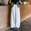 Calça de bolso estilo coreano com cintura elástica, modelo novo outono 2026, solta, modeladora, casual, versátil, estilo preguiçoso, calça longa