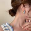 Aretes colgantes vintage de moda de primavera y verano azul agua con aceite goteado 2025 nueva explosión alto sentido arete nicho temperamento aretes