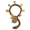 Pulseira do deus da riqueza de cinco vias estilo Xizang oito santos padroeiros cinco mestres Manjushri deus da riqueza amarelo thangka corda tecida à mão pulseira do ano desta vida