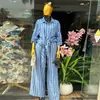 Moda Femenina Transfronteriza Europea y Americana Primavera 2026 Nuevo Elegante Conjunto de Camisa Larga Azul a Rayas y Pantalones de Pierna Ancha