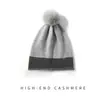 100% Cachemira Otoño/Invierno 2026 Nuevo Gorro de Punto para Mujer Casual Bloque de Color Pompón Borde Enrollado Cálido Protección para los Oídos Sombrero