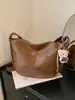 Comercio exterior popular este año Bolso cruzado estilo retro Maillard 2026 nuevo estilo moderno de moda versátil casual bolso tipo dumpling
