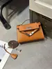 El Bolso Kelly de Segunda Generación Más Vendido de Xiaohongshu 2026 Nuevo Bolso de Mano Mini de Alta Gama Tendencia Bolso de Hombro Cruzado para Mujer