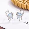 Pendientes de botón huecos de Piedra Lunar dulces, frescos y que se derriten, adorables para mujer, lujo ligero, diseño simple de nicho, personalidad, pendientes de alta calidad