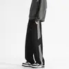 Calça casual listrada estilo americano para homens, nova coleção outono/inverno 2026, calça esportiva de corte largo moderna e solta, moda masculina