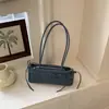 Bolso de mano elegante y sencillo con lazo, bolso versátil para hombro y axila, nuevo diseño de nicho 2026 para el día a día
