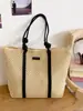 Bolsa de palha trançada transfronteiriça para mulheres, nova bolsa de palha casual da moda, bolsa de ombro tote simples e versátil de nicho para o verão de 2026