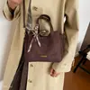 Bolso cubo, versátil y elegante, con una lujosa textura de gamuza, un bolso cruzado de moda, un nuevo bolso de hombro de nicho y moderno para mujer, 2026