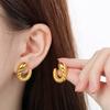Pendientes de moda transfronteriza europea y americana con diseño de espiral irregular y forma de serpiente, de acero inoxidable chapado en oro de 18 quilates.
