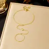 Pulsera de Cadena Fina Dorada Brillante Venta Caliente Transfronteriza Europea y Americana Acero Inoxidable Chapado en Oro Sensación de Alta Gama Joyería para Mano de Mujer