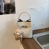 Bolso de Mano Pequeño Estilo Coreano para Mujer, Nuevo Bolso de Hombro Vintage Primavera 2026 para el Trabajo y los Viajes Diarios, Bolso Cruzado Tipo Cubo