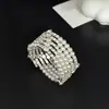 Pulsera de Mano de Perlas Multicapa de Nuevo Estilo Europeo y Americano con Alambre de Acero Incrustado de Diamantes Elástica para Mujer Pulsera de Lujo Ligero Venta al por Mayor B355
