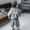 Conjunto de Sudadera con Capa para Niños Primavera y Otoño Nuevo 2026 Estilo Coreano Versátil Atuendo de Otoño para Niños Conjunto de Moda de Dos Piezas