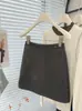 Nueva minifalda retro de mezcla de lana para otoño/invierno 2026, ajustada a la cadera, línea A, para mujer, de cintura alta, anti-exposición
