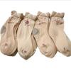 Primavera y verano con medias de mujer calcetines cortos jacquard medias cortas de terciopelo medias color carne para mediana edad y ancianas fabricantes de calcetines