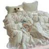 Conjunto de cuatro piezas de encaje de algodón puro estilo princesa coreana, conjunto de tres piezas de funda de edredón para dormitorio de algodón lavado estilo fresco y cremoso de Instagram