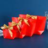 Bolsa lingote de lazo en stock cartón blanco bolsa de mano para regalo de Navidad bolsa de papel para compras de ropa colorida bolsa de embalaje