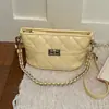 Bolso de axila texturizado transfronterizo para mujer, nuevo modelo 2026, bolso de hombro de alta gama para el trabajo y los desplazamientos, bolso cruzado con cadena de patrón de diamante