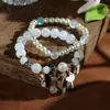 Nuevos brazaletes de estilo étnico, brazaletes de cristal hechos a mano de nicho para estudiantes, niñas, parejas y mejores amigos, al por mayor