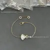 Bvlgari brazalete abanico falda pequeña baño de oro grueso cadena doble 18K ágata natural versión exquisita estilo femenino en stock al por mayor