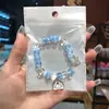 Libro Caperucita Roja Mismo Estilo Estudiante Pulsera de Glaseado de Palomitas de Maíz Hecha a Mano con Cuentas Dibujos Animados Cristal Pulsera Infantil Venta al por Mayor Cajas de Regalo