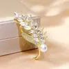 08 broche de moda simple regalo femenino alta gama nicho al por mayor estilo nacional broche joyería fija fabricantes pelo liso
