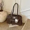 Bolso de Hombro Único Estilo Coreano para Axila Bolso Tote Retro de Cuero Suave para Viajes Diarios para Mujeres Mochila Casual Multifuncional Nueva 2025