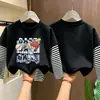 Camiseta de manga larga para niño, imitación dos piezas, algodón puro, nuevo estilo otoño 2026, para niños mayores, top básico para primavera y otoño
