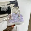 Nova Coleção Outono/Inverno 2026: Bolsa tipo concha da moda com lantejoulas brilhantes, bolsa transversal feminina, item popular de comércio exterior, bolsa de ombro