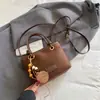 Bolsa feminina vintage de alta qualidade, nova bolsa de outono 2026, camurça versátil, bolsa transversal tipo balde casual, bolsa feminina texturizada