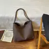 Otoño 2026 Nuevo Bolso Cubo Gran Capacidad Sensación Relajada Para Viajar con Estilo Bolso de Hombro Único Bolso para Mujer Debajo del Brazo