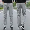 Calça casual de alta qualidade cinza claro para homens, corte reto solto, calça de outono, novo modelo primavera/outono 2026, tamanho grande, comprimento longo