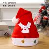 Venta caliente transfronteriza de decoraciones navideñas de dibujos animados de Papá Noel con luces, gorro navideño rojo no tejido, regalo de Navidad
